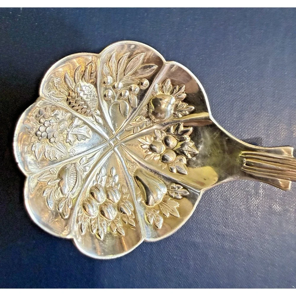 sheffield england silverplated berry ladle shell pattern